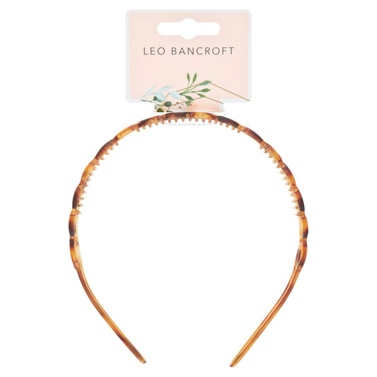 Plastic Headband Tort. by LEO BANCROFT